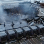 Burnt out warehouse caused by battery fire