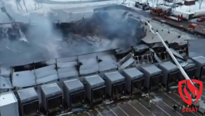 Burnt out warehouse caused by battery fire